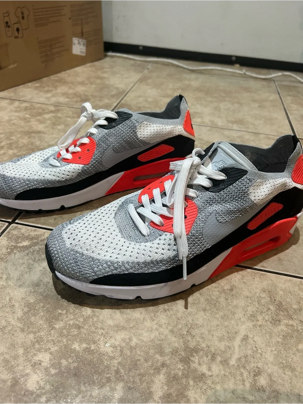 Nike Men’s Flyknit Sneakers in Grey, White & Red-Orange